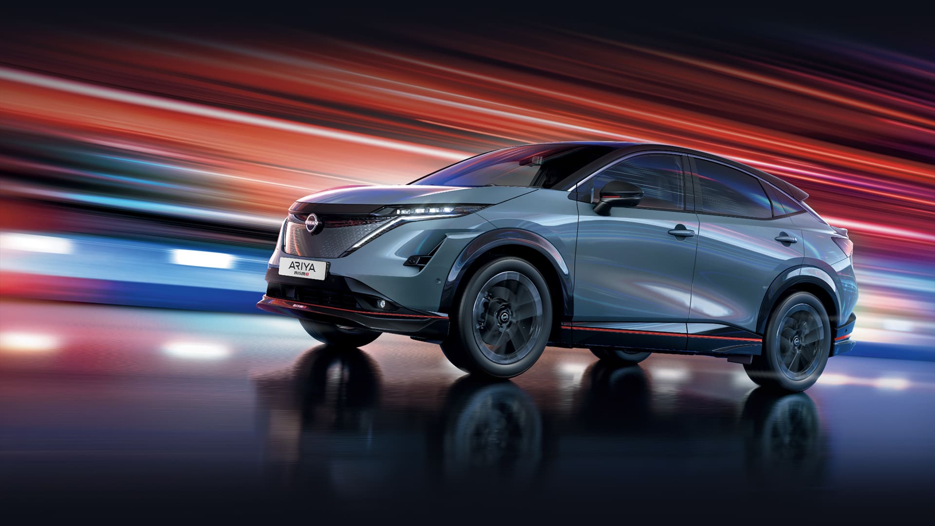 Video Nissan Ariya Nismosta, missä esitellään etuvaloja ja muita ulkoisia ominaisuuksia satamakonttien edessä 
